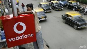 Vodafone seals merger to become India's biggest telecoms group (c) AFP Sajjad Hussain