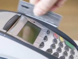 Visa slashes fee on debit card payments in India (c) The Economic Times