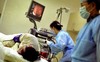 China to allow patients to claim insurance for private hospital visits (c) Reuters