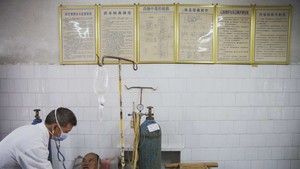 Chinas public hospital doctors to lose iron rice bowls (c) SMCP