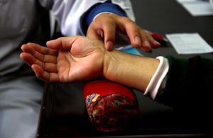 China healthcare costs forcing patients into crippling debt (c) Reuters David Gray