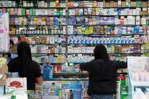 China lifts price control on most medicines (c) AFP Photo Anthony Wallace
